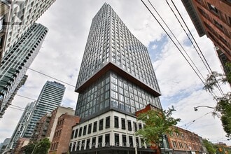 Building Photo - 100 Queen St E