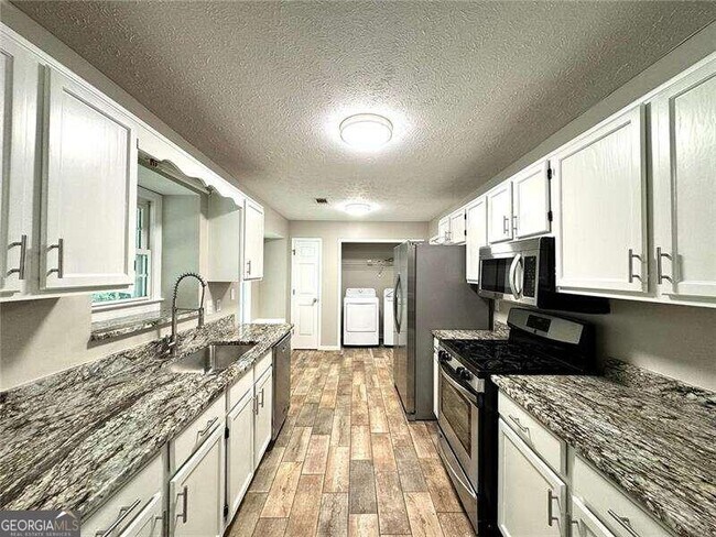 Building Photo - 829 Riverstone Ln