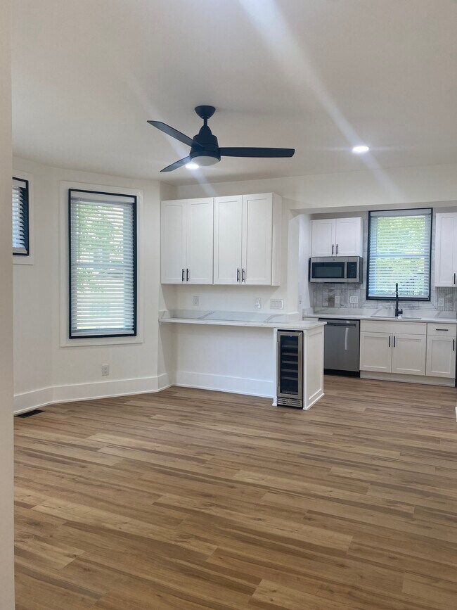 Wrap around bar with beverage fridge - 3409 Fernside Pl