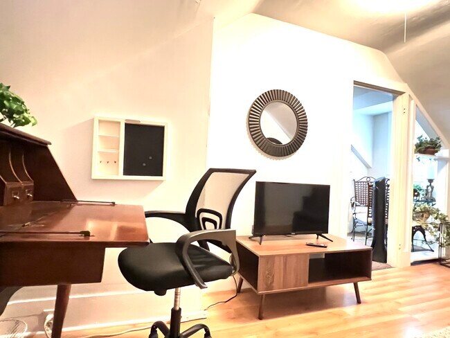 Desk and TV area - 613 Birch St