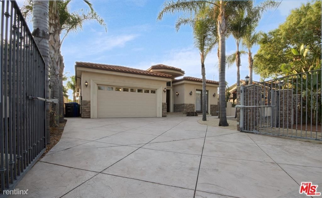 Foto principal - 3 br, 2.5 bath House - 5931 Rhodes Ave