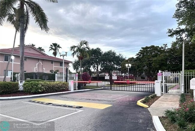 Building Photo - 3241 Sabal Palm Manor