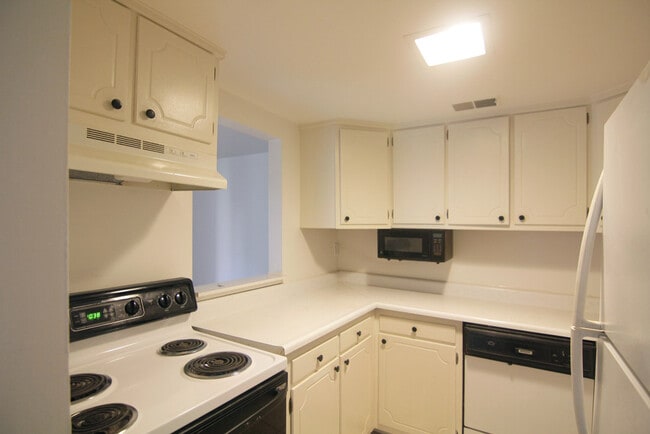 Kitchen w/ Dishwasher - Village Square