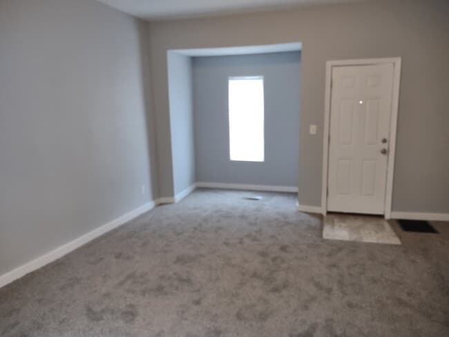 Living Room from kitchen doorway. - 858 3rd St NW