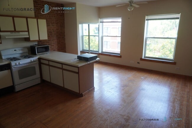 Building Photo - 1251 W Devon Ave