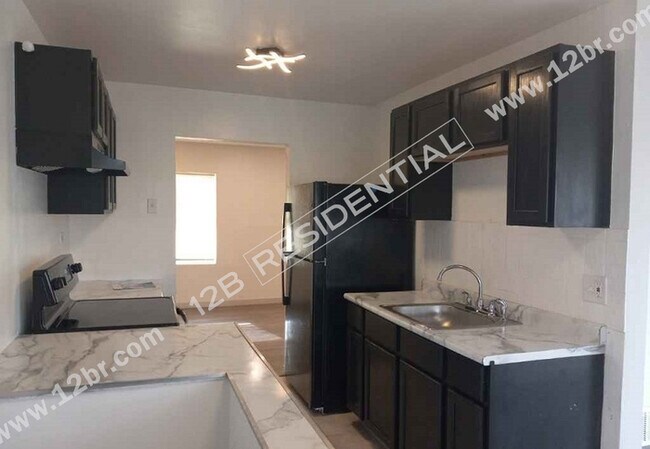 Building Photo - 4-Bedroom Home with Basement