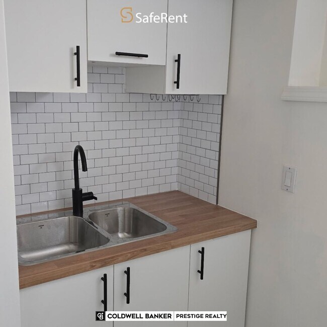 Photo du bâtiment - 362 14th St W