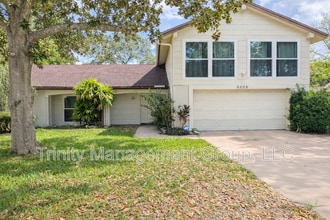Building Photo - 8605 Wagon Wheel Ln