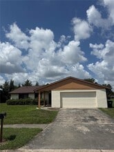 Building Photo - 10719 Lazy Lake Dr