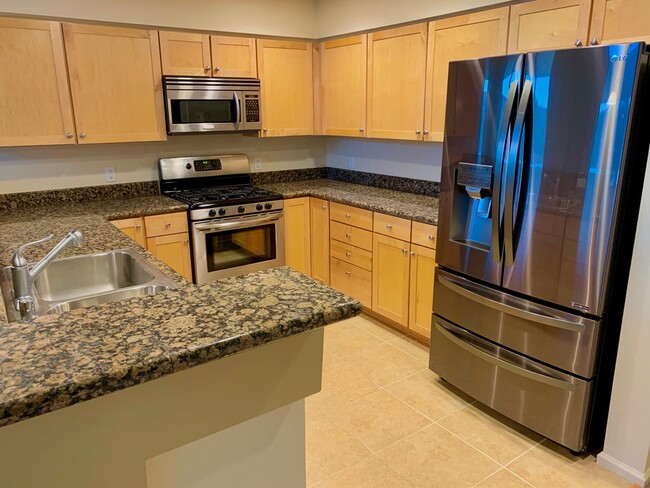 High-end kitchen, newer LG black stainless fridge with water/ice - 21 Canyon View