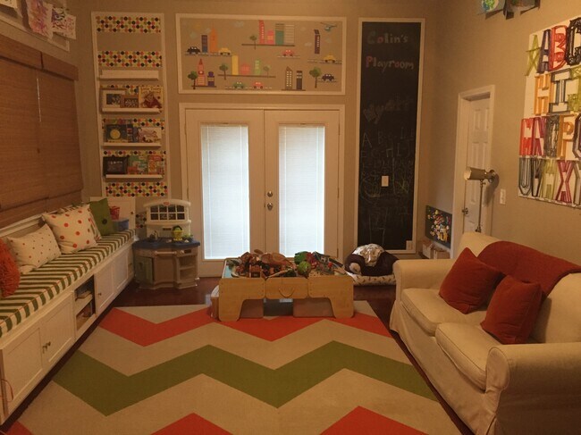 Downstairs bedroom w/ walk-in closet - can also be used as play room, guest room, music room, etc. - 694 Schuyler Avenue Southeast