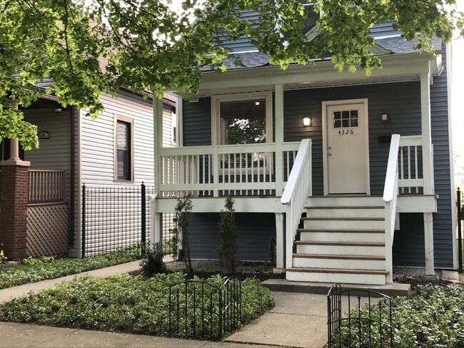 Property street view; front yard fence since added - 4326 N Central Park Ave