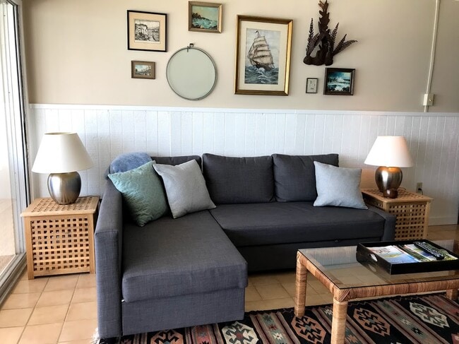 Living room with vintage nautical decor - 19450 Gulf Blvd