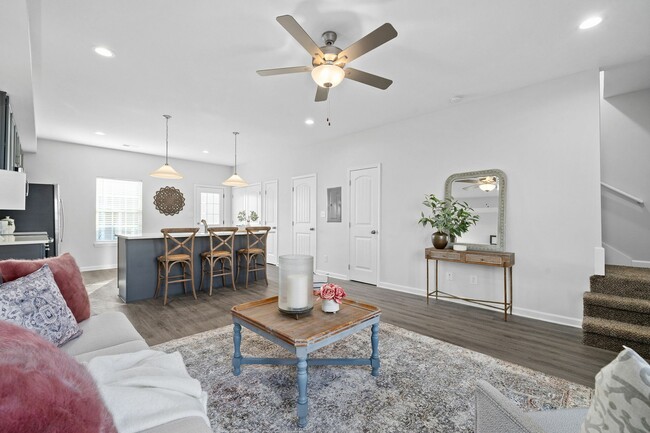 Spacious Living Room with Wood Style Flooring - Victory Place