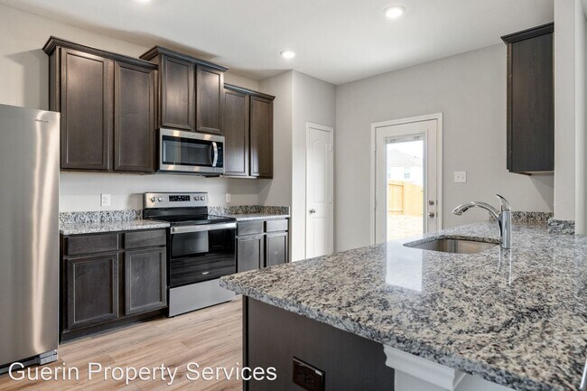 Foto del edificio - 3 br, 2.5 bath House - 9139 Bennet Forest