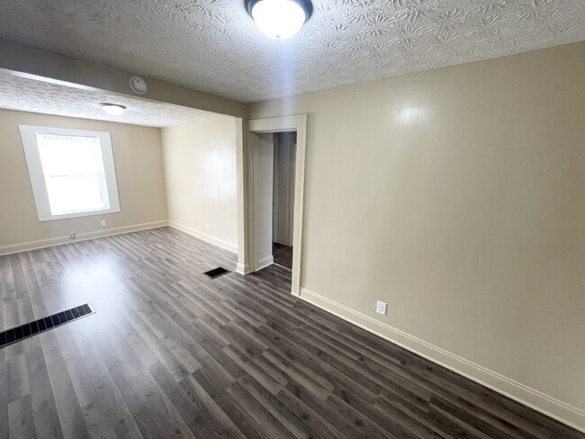 Building Photo - 3 Bedroom Home  with huge, 2-car garage/workshop combo (has electricity)