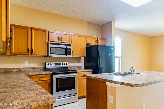 Foto del edificio - 4220 Plantation Oaks Blvd