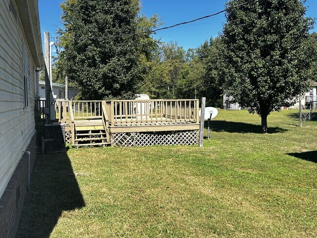 Building Photo - "Charming 3-Bed, 2-Bath Mobile Home Retrea...