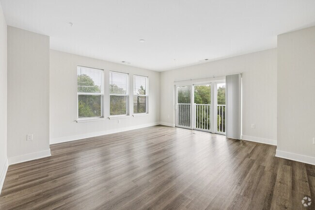 C40K-H - 3BR, 2BA - 1,307SF - Living Room - Attain at Chic's Beach