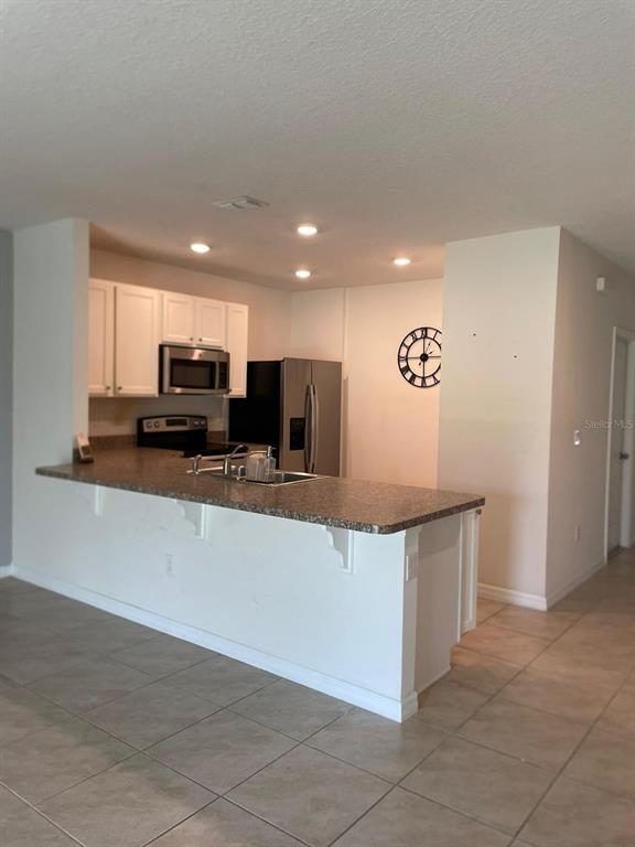Foto del edificio - 9004 Wildflower Ln