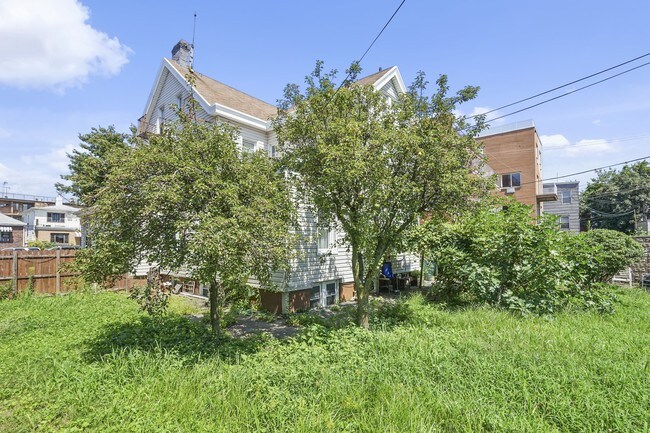 Building Photo - 8739 19th Ave