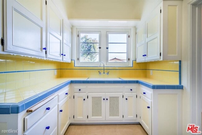 Building Photo - 2 br, 1.5 bath Condo - 1607 Stearns Dr # Top
