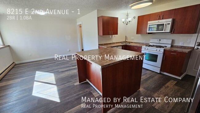 Building Photo - All Utilities Paid Fully Remodeled Ground ...