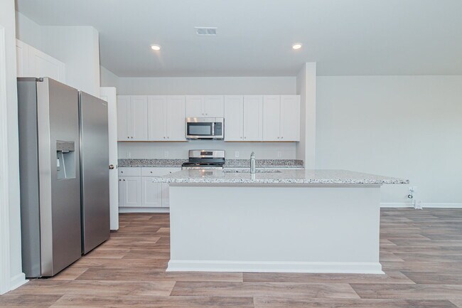 Building Photo - Spacious 3 bedroom Townhome with pond view