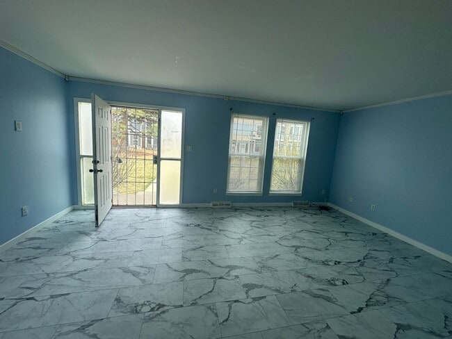 Photo - Long Realty & Property Management LLC - 4 bedroom 2.5 Bathroom in Aurora Townhome