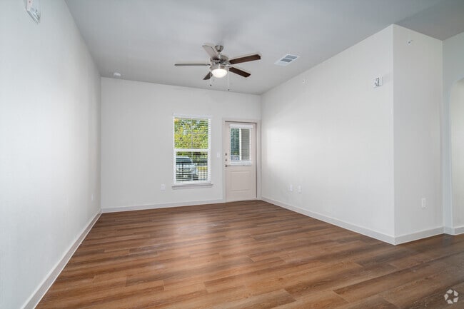 3BR, 2BA - 1192SF - Living Room - Village at the Loop