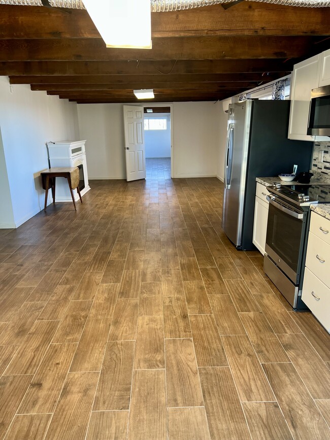 View of kitchen and living room - 8442 McCrory Ln