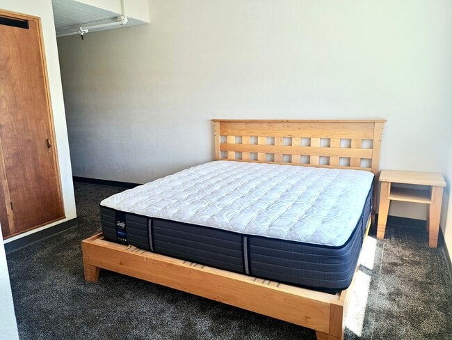 Building Photo - Rare and Limited 2BR/2BA Efficiency Room – All Utilities & Wi-Fi Included!