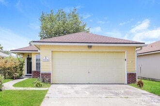 Building Photo - 7319 Volley Dr N