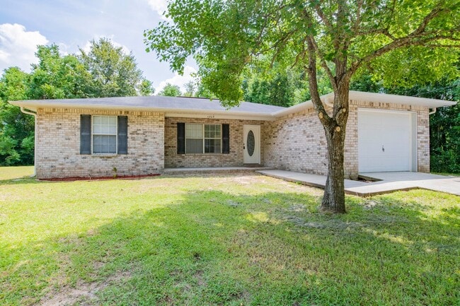 Building Photo - Adorable home in Pace