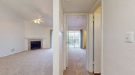 Welcome to your new beginning at 2335 W Seminole Blvd, Sanford FL 32771! This delightful 600 square foot home is your gateway to a life of comfort and simplicity. As you step inside, you're greeted by an open concept living area that seamlessly blends kitchen and living space, creating an atmosphere of warmth and togetherness.

The heart of the home, the kitchen, boasts warm wood cabinetry that adds a touch of rustic charm while providing ample storage. Modern appliances stand ready for your culinary adventures, making meal preparation a joy. The open design allows you to entertain guests or keep an eye on loved ones while you cook.

The living area is a blank canvas for your imagination. With plush carpeting underfoot and a sliding glass door leading to the outdoors, this space is filled with natural light, creating an airy and inviting ambiance. The room's focal point is a beautiful fireplace, perfect for cozy evenings and adding a touch of elegance to your living space.

The bathroom is a serene retreat, featuring clean lines and a neutral color palette. The combination of tile and wood-look flooring adds texture and warmth, while the vanity provides storage for all your essentials.

This home also includes the convenience of in-unit laundry, making chores a breeze and freeing up your time for what really matters. The closet space ensures that everything has its place, supporting a clutter-free lifestyle.

Whether you're a first-time homebuyer, looking to downsize, or seeking a low-maintenance lifestyle, this charming home offers the perfect blend of comfort and efficiency. Embrace the freedom of simplified living and make this delightful space your own. Your journey to a more mindful, content life starts here!