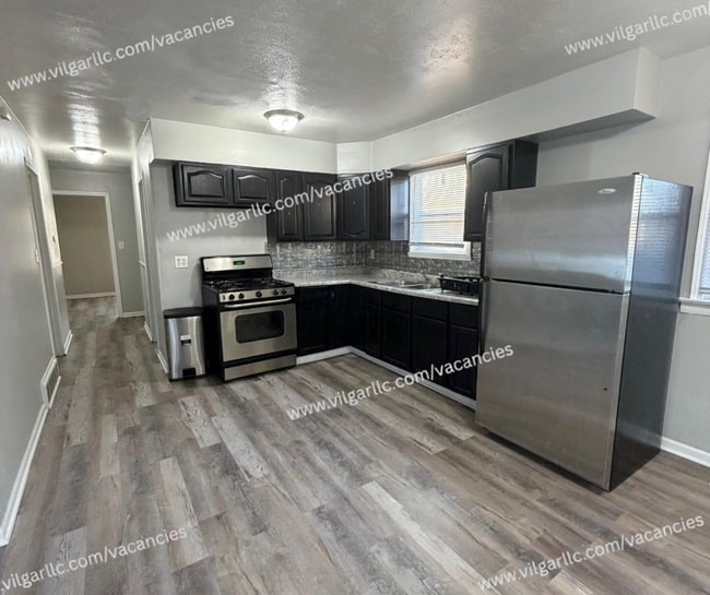 Building Photo - Discover comfort, convenience, and quality living in this beautifully updated 3-bedroom single-fa...