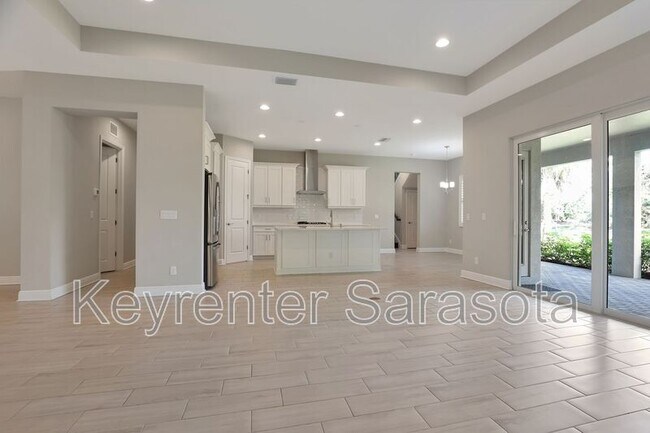 Building Photo - 6133 Lungo Lago Dr