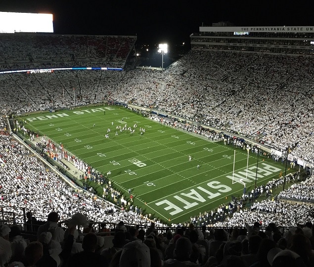 Football fans cheer on the Penn State Nittany Lions
