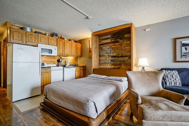 Building Photo - Fully Furnished Studio