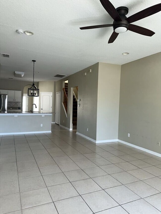 Building Photo - PALM COVE - 4/3 WITH ADDITIONAL DEN AND UPSTAIRS LOFT