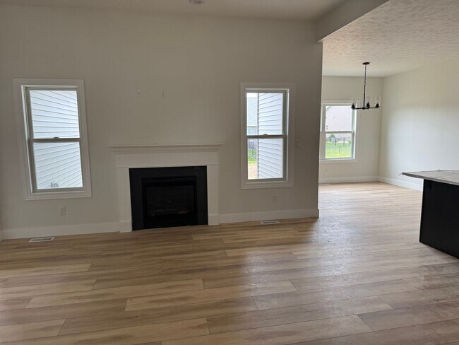Building Photo - New Construction! West side location. 4br,...