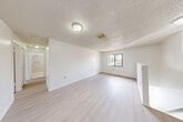 Located in Kendall West, Florida, this single-floor, 3-bedroom, 2-bathroom home offers a clean and functional layout designed for comfortable living. The interior is finished with light wood-style flooring throughout, crisp white walls, and textured ceilings, creating a bright and cohesive aesthetic.

The primary bedroom is a generously sized retreat, featuring a large window that invites natural light and offers views of the surrounding neighborhood. The two additional bedrooms are well-proportioned, each with their own windows framing outdoor scenery, making them versatile spaces for various needs.

The two bathrooms differ in style and function. One features warm-toned stone-look tile flooring paired with a white tiled tub-shower combination and a vanity with sink. The second bathroom offers a walk-in shower with light tile surround and matching tile flooring, providing a practical and clean finish.

The layout also includes an entrance, a hallway connecting the rooms, and a dedicated closet for storage. Ceiling-mounted vents are present throughout, indicating a central air system—well-suited for the South Florida climate. The overall design emphasizes simplicity and functionality, making this home a solid, move-in-ready option in the Kendall West community.