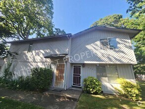 Building Photo - 9387-9387 SW Tangela Ct