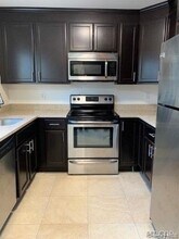 Building Photo - 235 B Manorhaven Blvd