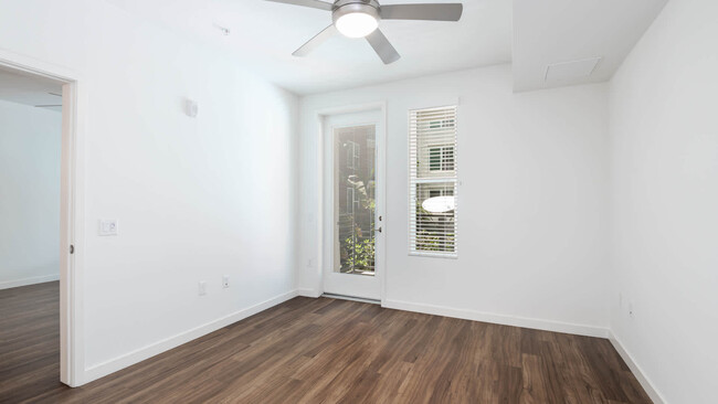 Bedroom with Balcony and Hard Surface Flooring - The Alton