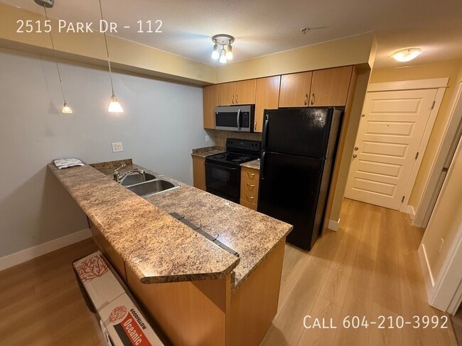 Building Photo - Condo in Central Abbotsford