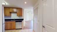This contemporary 850 square foot apartment offers a well-designed living space with two bedrooms and two full bathrooms. The open-concept floor plan combines the living room and kitchen, creating a spacious and inviting atmosphere. The kitchen boasts modern cabinetry, stainless steel appliances, and dark countertops, perfect for culinary enthusiasts.

Both bedrooms feature ample closet space and large windows that flood the rooms with natural light. The primary bedroom, measuring 180 square feet, provides a generous retreat. The bathrooms are outfitted with modern fixtures, including a combination tub-shower in one and a standalone shower in the other.

Throughout the apartment, you'll find durable and attractive wood-look flooring, adding warmth and easy maintenance to the space. Large windows in the living area and bedrooms offer picturesque city views and create a bright, airy ambiance.

The apartment's design maximizes functionality with built-in storage solutions and a layout that separates living and sleeping areas for privacy. With its contemporary finishes, efficient use of space, and prime location, this apartment presents an ideal urban living experience.