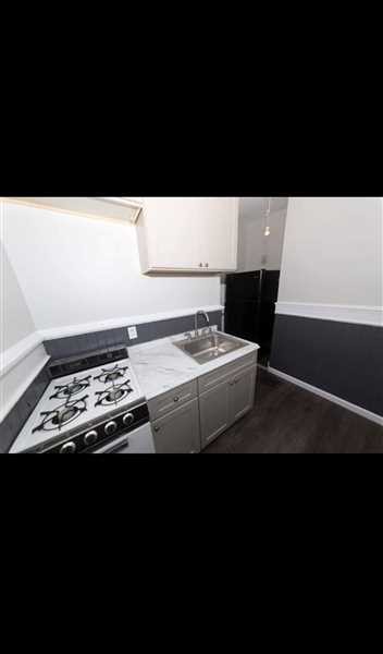 Primary Photo - Newly renovated kitchen and updated bathroom