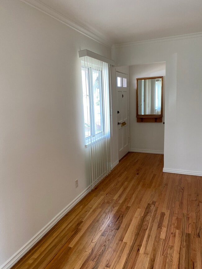 Entryway with hardwood floors - 8015 Teesdale Ave