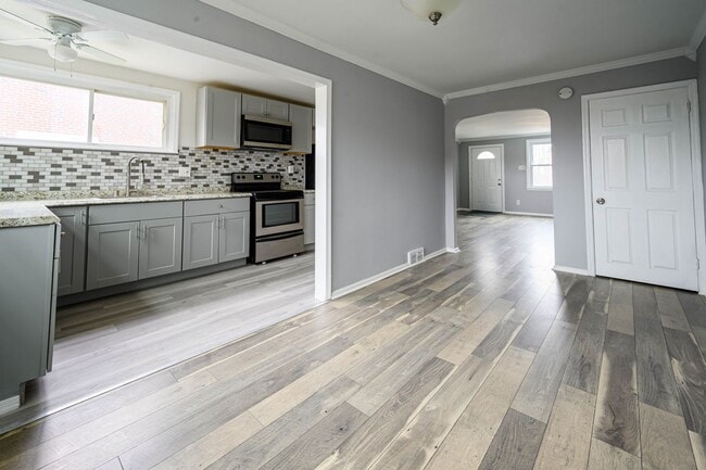 Photo - End row home! Stainless appliances, Laminate flrs., New Carpet, Central A/C, Garage, two (2) car ...